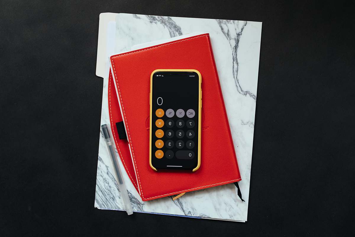 cell phone black Android smartphone on red flip case electronics